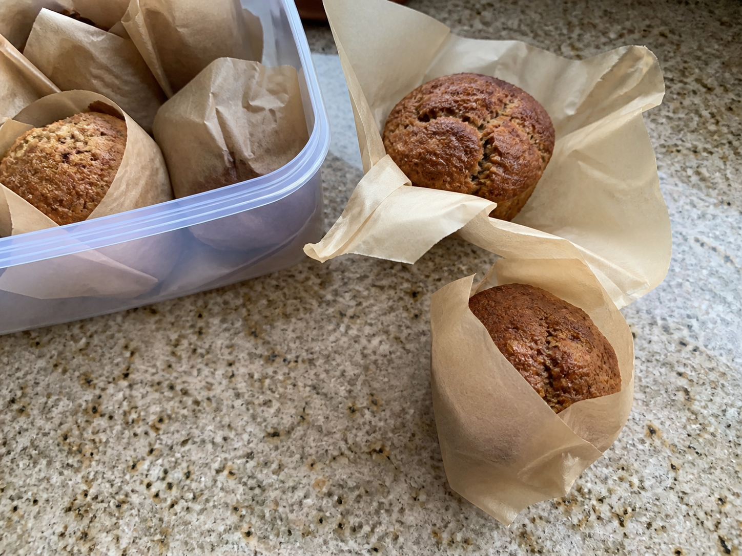 Muffins wrapped in parchment before freezer storage