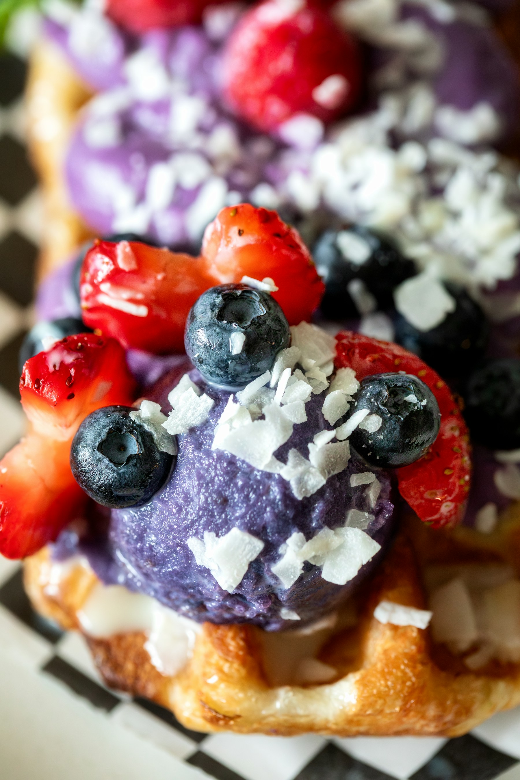 Waffle topped with berries, suitable as a no-added-sugar serving idea